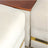 Modern L‑Shaped Cream Sofa with Wooden Armrests