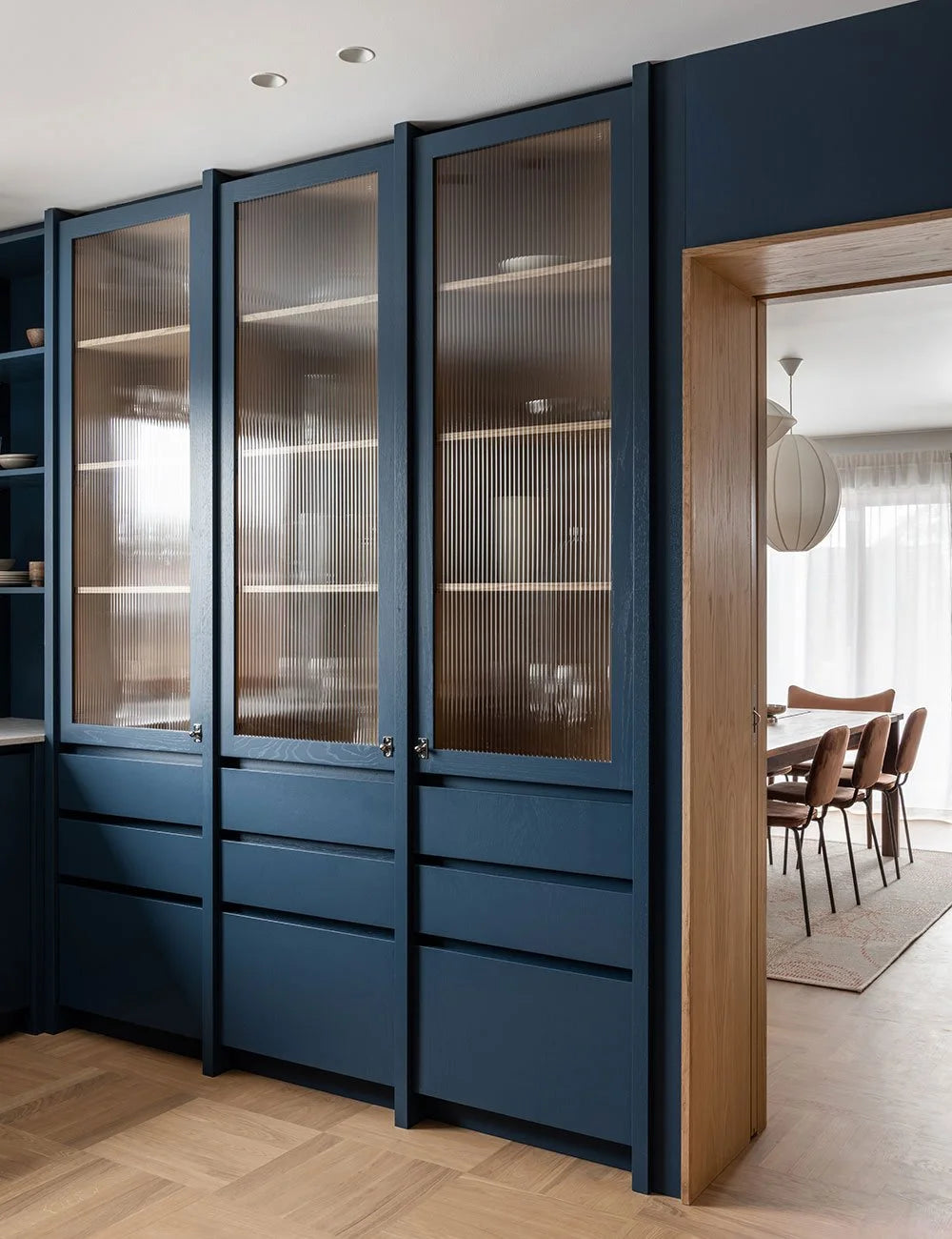Blue & Natural Wood Contemporary Kitchen with Warm Tones & Blue Accents