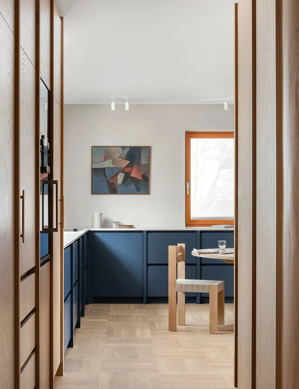 Blue & Natural Wood Contemporary Kitchen with Warm Tones & Blue Accents