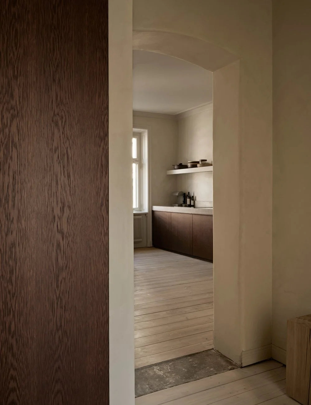 Dark Oak & Limestone  Minimalist Kitchen with Natural Earthy Tones