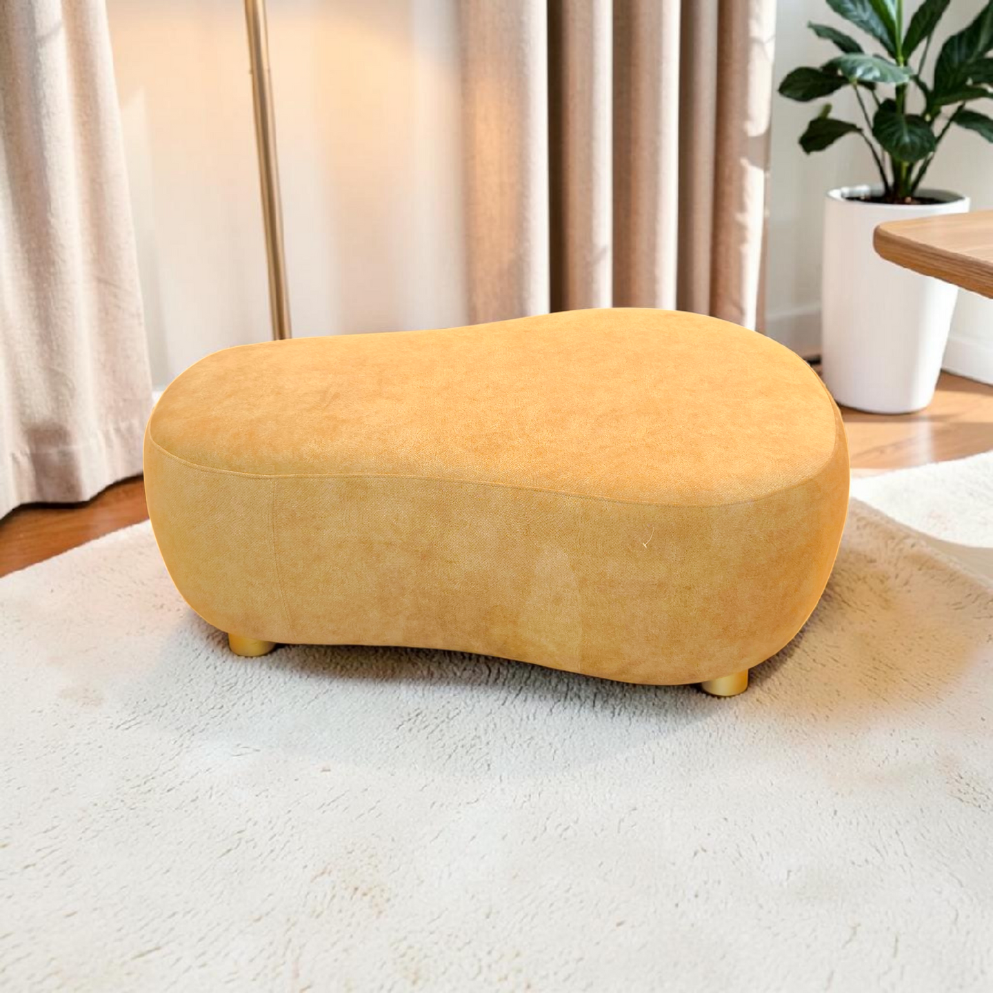 Organic‑Form Modern Ottoman in Soft Mustard Upholstery