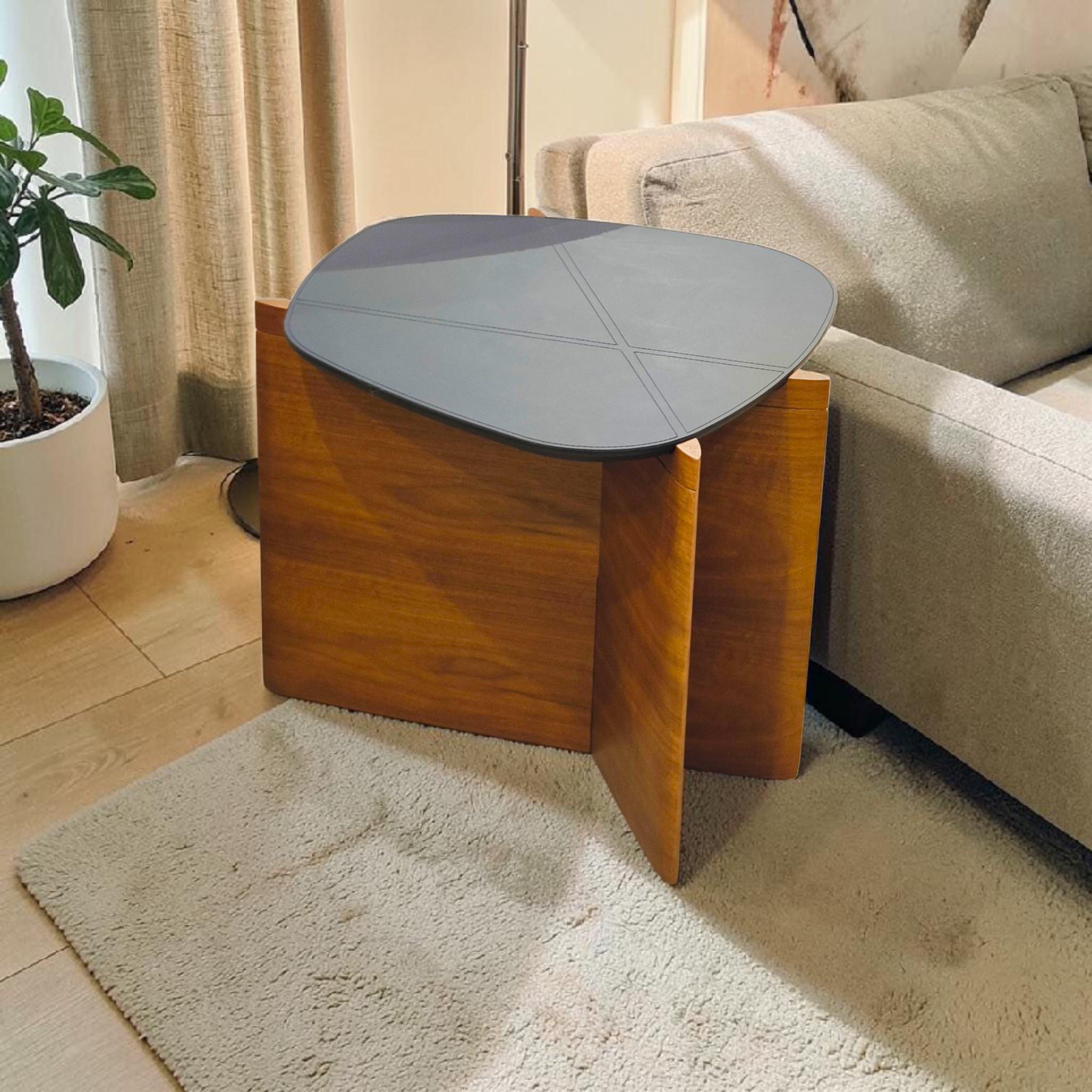 Geometric X‑Base Side Table with Dark Sculpted Top