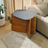 Geometric X‑Base Side Table with Dark Sculpted Top