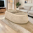 Oval Marble Coffee Table with Soft Upholstered Base – Modern Elegance