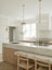 White Oak & Quartzite Timeless Kitchen with Airy Modern Elegance