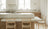 White Oak & Quartzite Timeless Kitchen with Airy Modern Elegance
