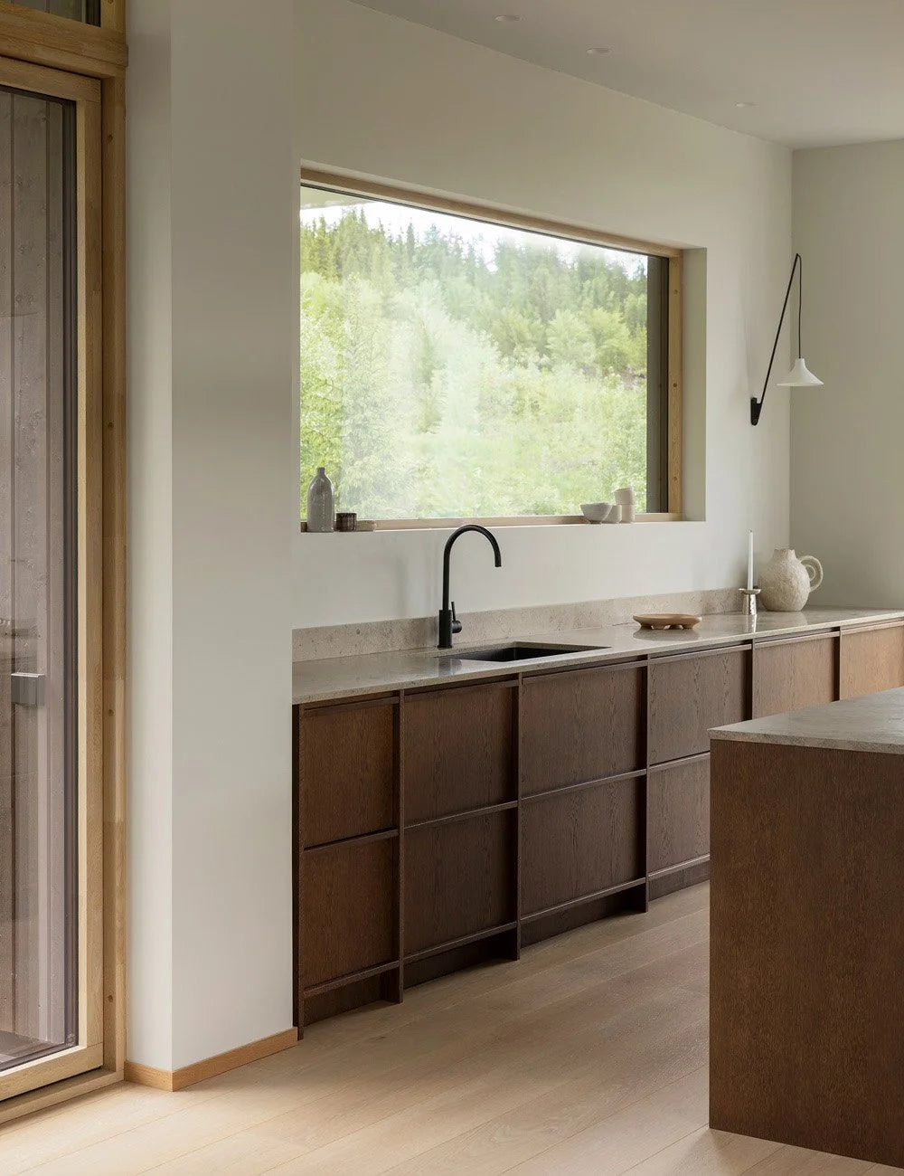 Minimalist timber kitchen with dark oak cabinetry
