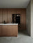 Dark Oak Architectural Kitchen Minimalist Kitchen with Rich Wood & Concrete