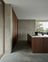 Dark Oak Architectural Kitchen Minimalist Kitchen with Rich Wood & Concrete