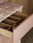 Light oak kitchen with pink kitchen island