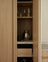 Light oak kitchen with pink kitchen island