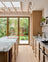 Contemporary Light Oak Scandinavian Kitchen with Natural Wood Finishes